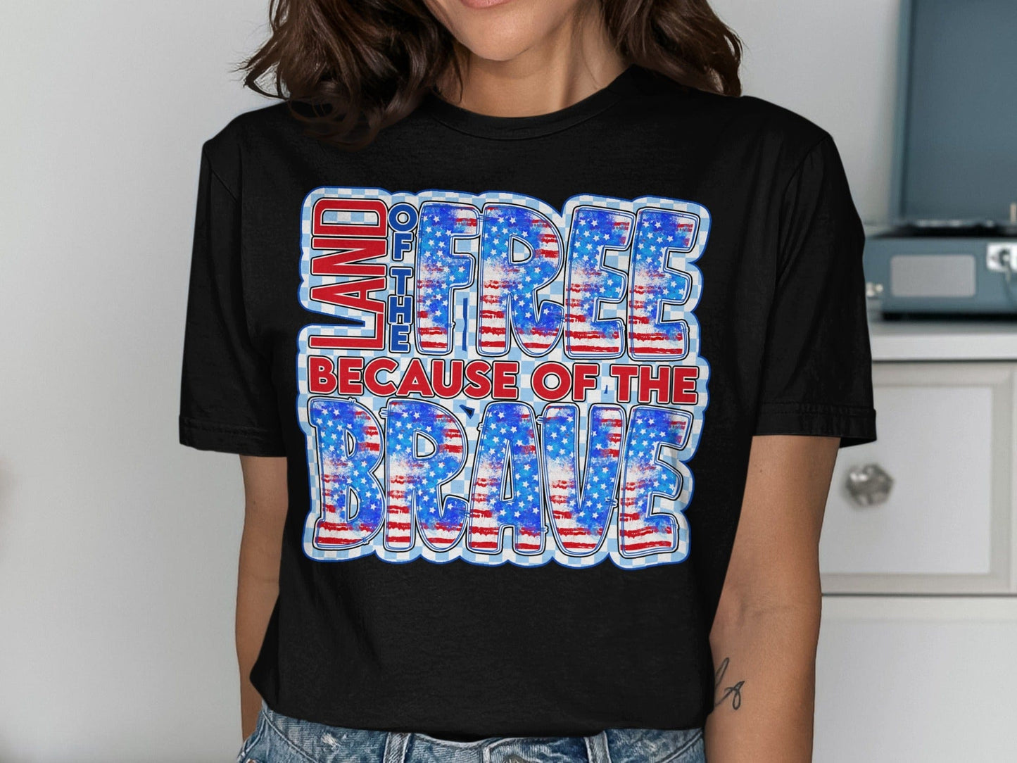 Jen Peete Designs Physical Item Land Of The Free Because Of The Brave Patriotic T-Shirt