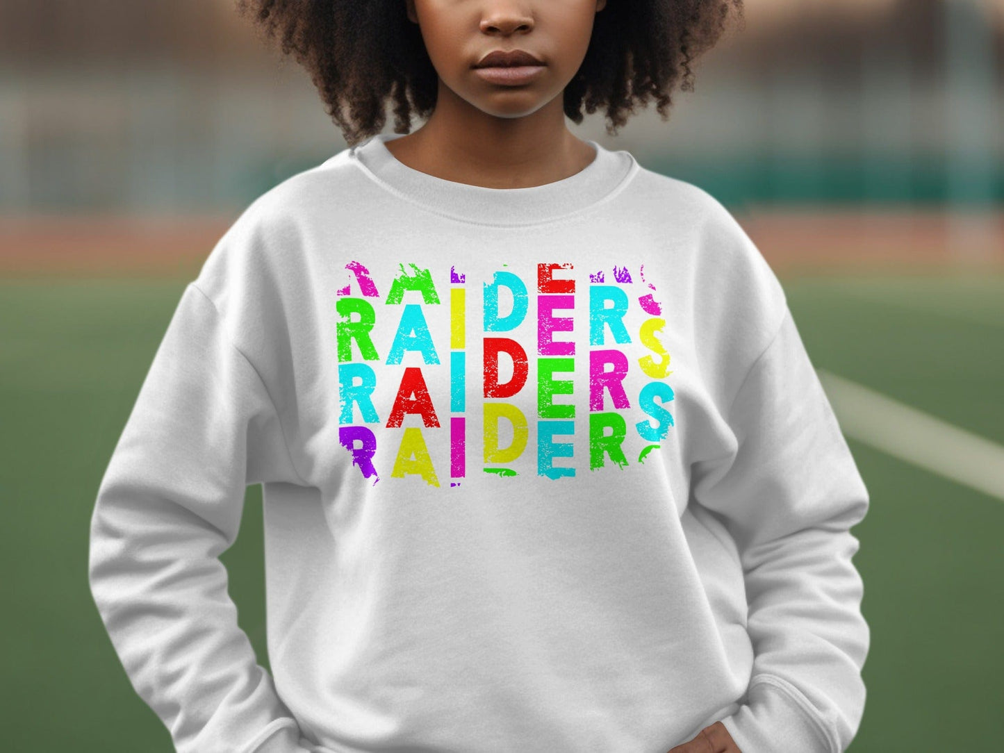 JPD Physical Item Raiders Text Multi Color Distressed Look in Short-Sleeve, Long-Sleeve, Crewnecks, and Hoodies