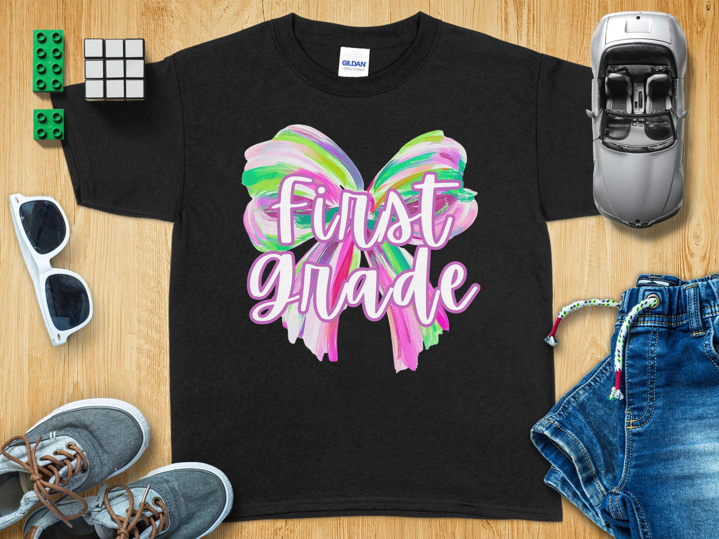Jen Peete Designs Youth Clothing First Grade Colorful Brush Strokes Bow Back to School T-Shirt
