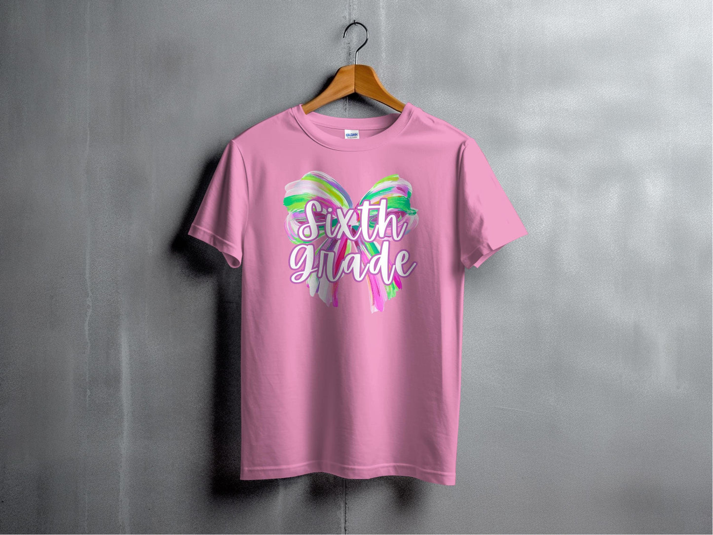 Jen Peete Designs Youth Clothing Sixth Grade Colorful Brush Strokes Bow Back to School T-Shirt