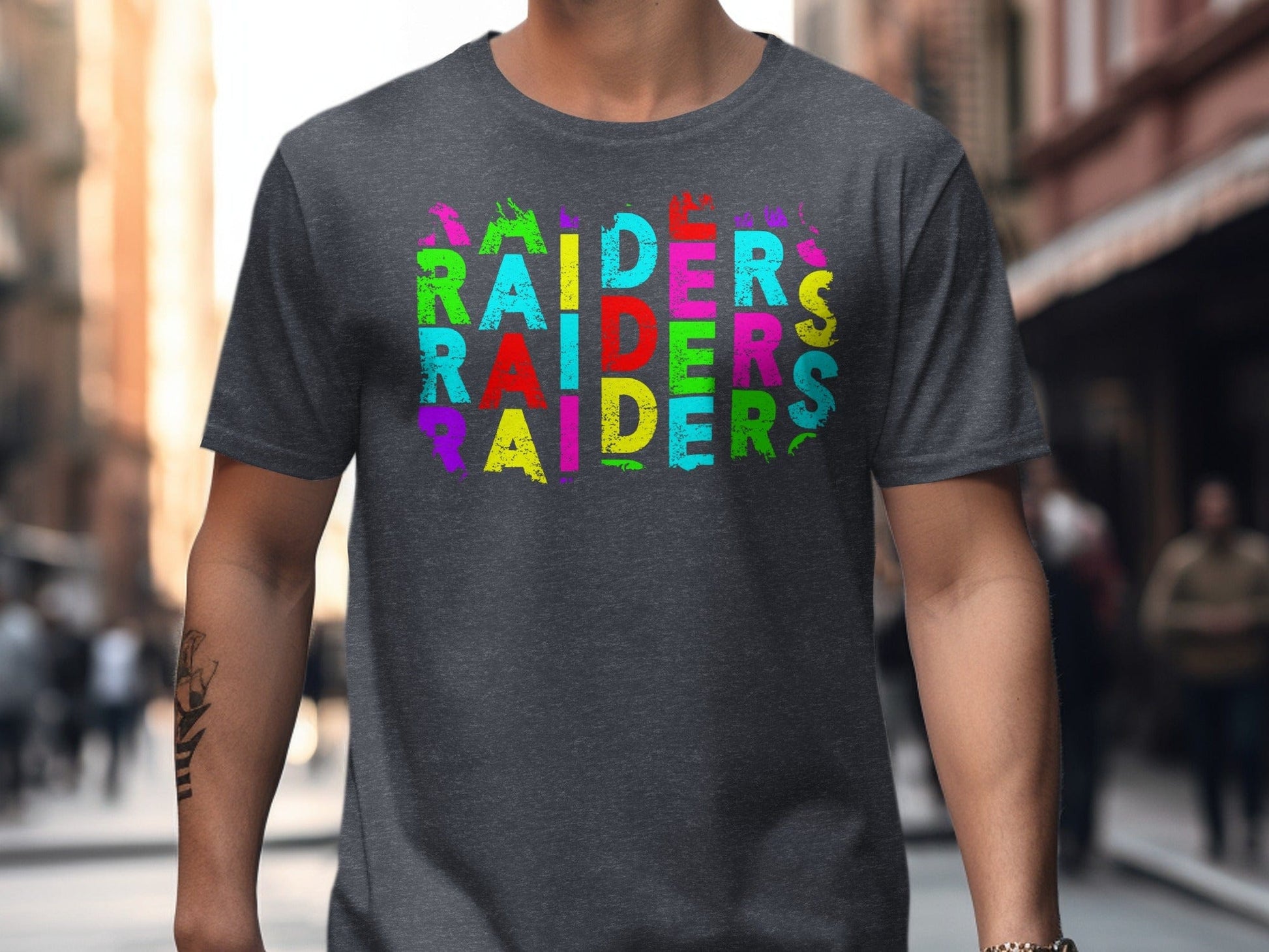 JPD Physical Item Raiders Text Multi Color Distressed Look in Short-Sleeve, Long-Sleeve, Crewnecks, and Hoodies
